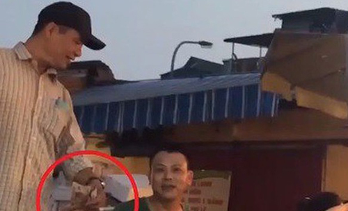 Bắt tạm giam 3 đối tượng vụ 'bảo kê' ở chợ Long Biên