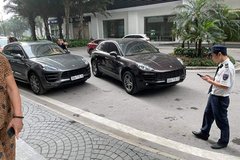 2 xe sang Porsche trùng biển số 'chạm mặt' tại Times City: Chủ nhân yêu cầu khóa bánh xe 'fake'