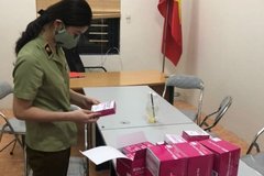 Phát hiện 800 bộ kit test COVID-19 'lậu' trên ô tô đỗ ở chung cư