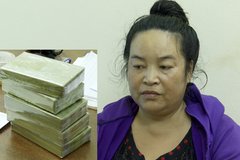 Bắt người phụ nữ vận chuyển 5 bánh heroin bằng taxi