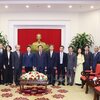 Đồng chí Phan Đình Trạc tiếp Bộ trưởng Bộ Tư pháp Trung Quốc Hạ Vinh
