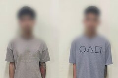 Khởi tố 2 đối tượng đánh, ép nam sinh lớp 10 quỳ, liếm biển số xe ở Hà Nội