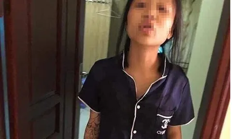 Hé lộ danh tính người phụ nữ xăm trổ xách lủng lẳng con nhỏ vài tháng tuổi trên tay?