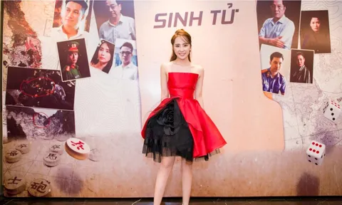 Cô 'Nhã tiểu tam' diện váy như đoá hồng tham dự ra mắt phim cùng Việt Anh