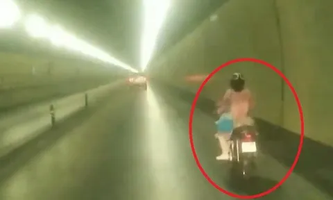 Truy tìm người phụ nữ liều lĩnh chạy xe máy qua hầm Hải Vân