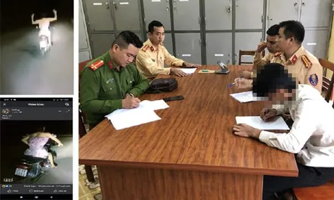 Xử phạt nam thanh niên mặc váy hồng, buông hai tay khi lái xe