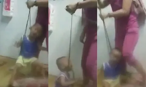 Bé trai bị mẹ bạo hành, buộc dây vào cổ