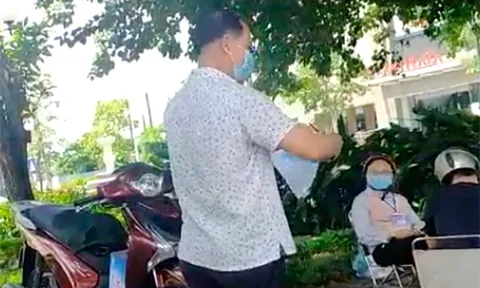 Vợ bị phạt vì vi phạm giãn cách xã hội, chồng xé biên bản xử phạt