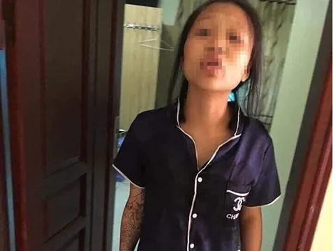 Hé lộ danh tính người phụ nữ xăm trổ xách lủng lẳng con nhỏ vài tháng tuổi trên tay?