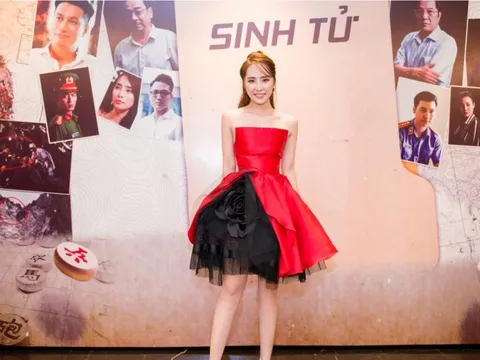 Cô 'Nhã tiểu tam' diện váy như đoá hồng tham dự ra mắt phim cùng Việt Anh