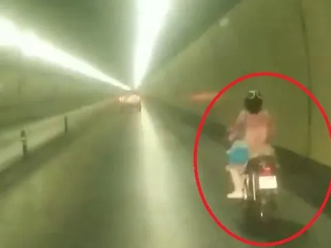 Truy tìm người phụ nữ liều lĩnh chạy xe máy qua hầm Hải Vân