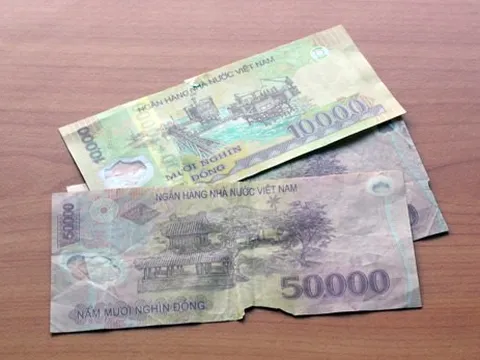 Tiền bị cháy có mang ra ngân hàng đổi được không?